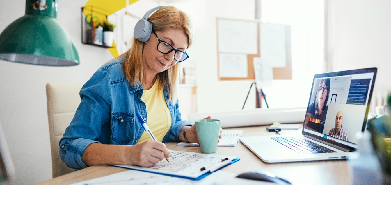 Person taking notes on call