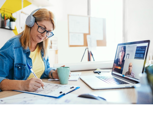Person taking notes on call