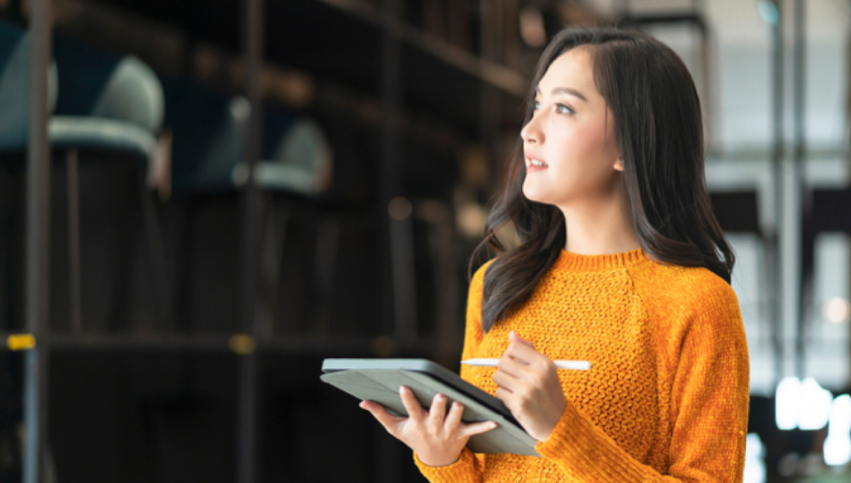 Woman working on tablet